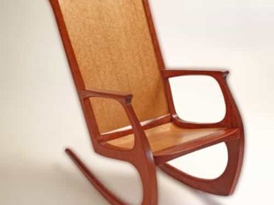 Bubinga Contemporary Rocking Chair
Bubinga with contoured Bird's Eye Maple Back & Seat
Chair Measures 39" Tall with a floor foot print size of 20" x 34" .  SOLD