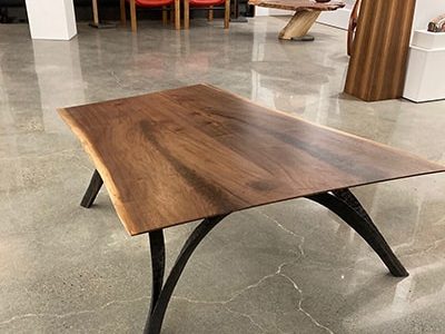 Walnut Live Edge coffee table with Ebonized legs.