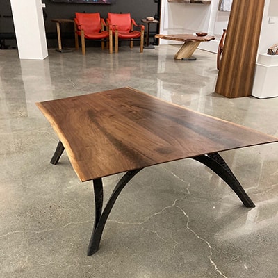 Walnut Live Edge coffee table with Ebonized legs.